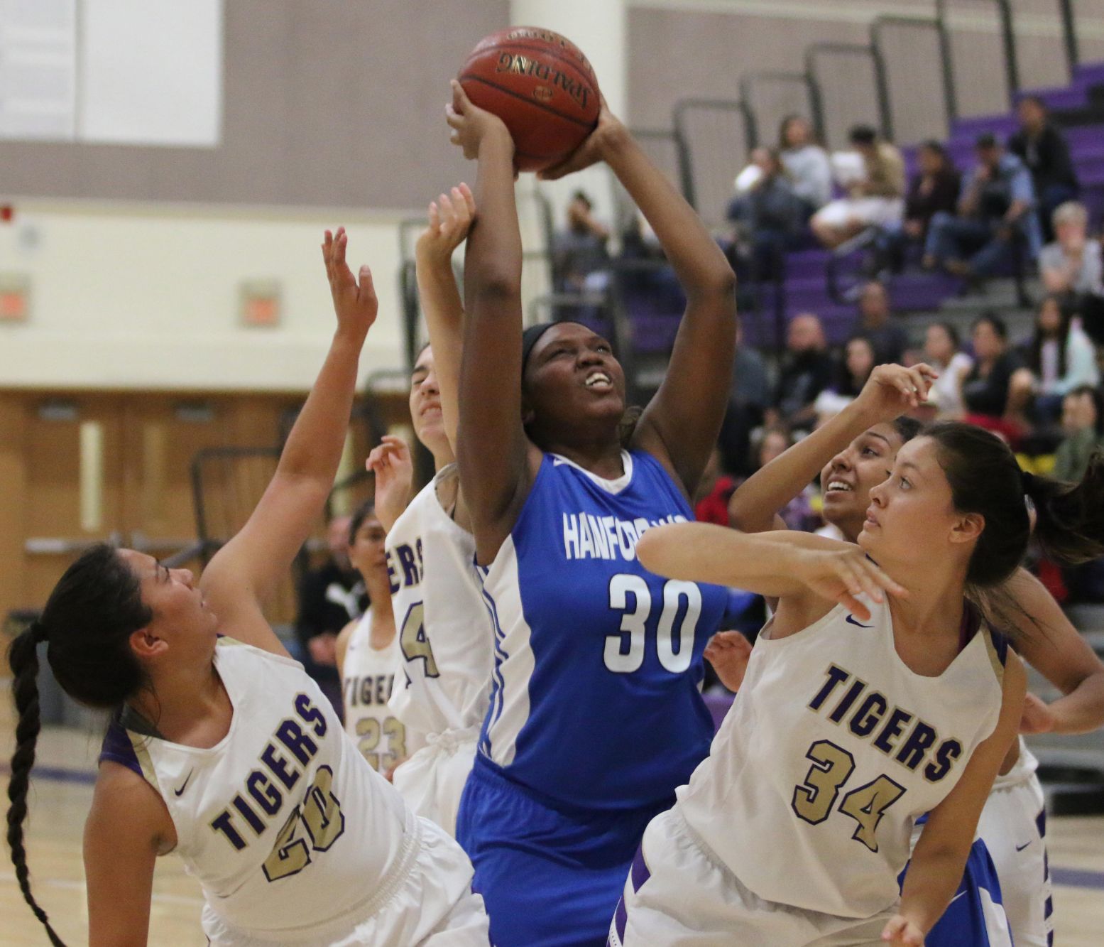 Tigers outshoot Huskies in the fourth